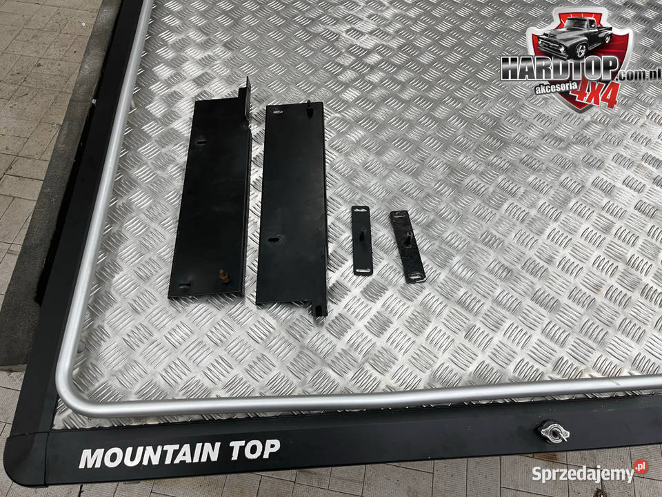 Pokrywa Nissan Navara 2006 Mountain Top