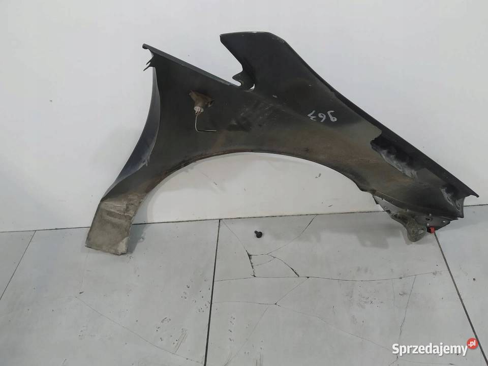 BŁOTNIK LEWY PRZÓD Z20R Opel Corsa IV 20062014 D
