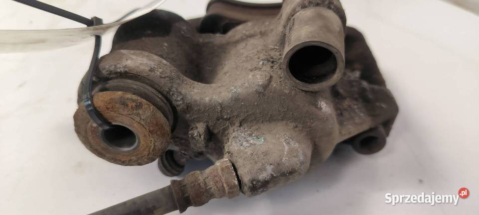 ZACISK HAMULCOWY PRZÓD PRAWY PEUGEOT 106