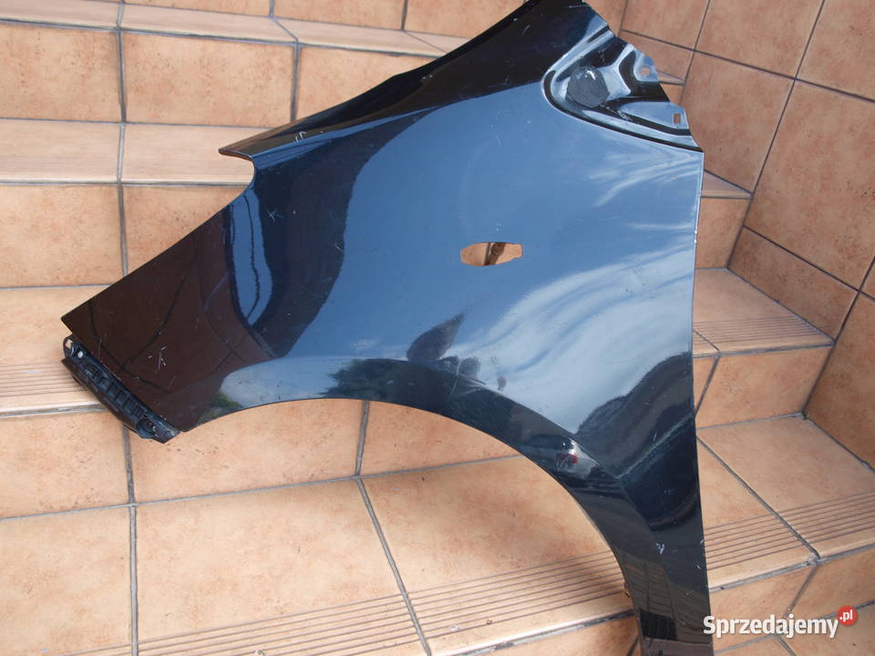Toyota Yaris 2 II błotnik lewy przód 2006 2011r Części samochodowe