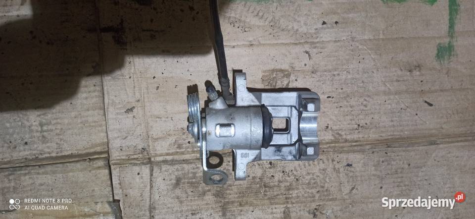 Zacisk hamulcowy tył Biała