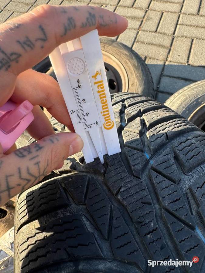 Opony zimowe Nokian 18565 R15 z felgami Kozy