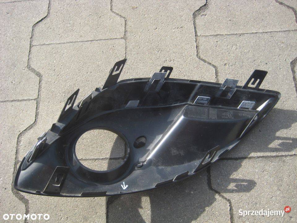 OPEL CORSA D KRATKA ZDERZAKA LEWA CHROM 13286025 Rakoniewice