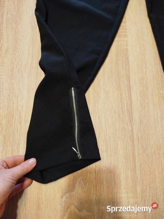 Eleganckie wygodne spodnie idealne stan rozmiar Spodnie Biecz