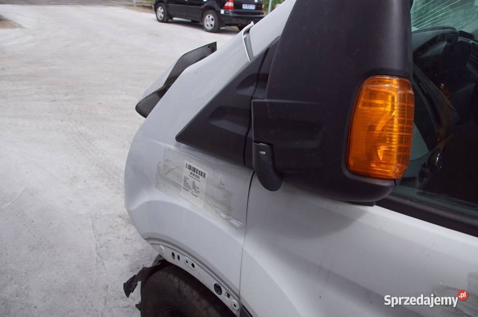 BŁOTNIK LEWY PRZÓD FORD TRANSIT MK8 FROZEN WHITE Lipno