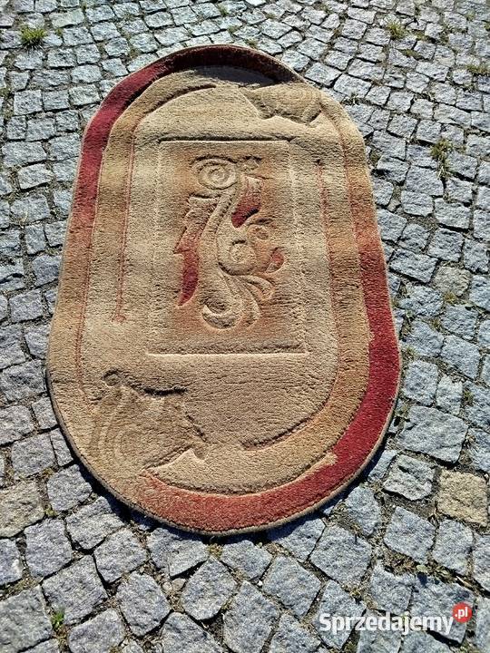 Dywan owalny 170x120 brązowoczerwony z wzorami Kraków