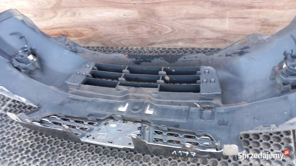 NISSAN QASHQAI J10 ZDERZAK PRZÓD KY0 HALOGEN Zbierkowo