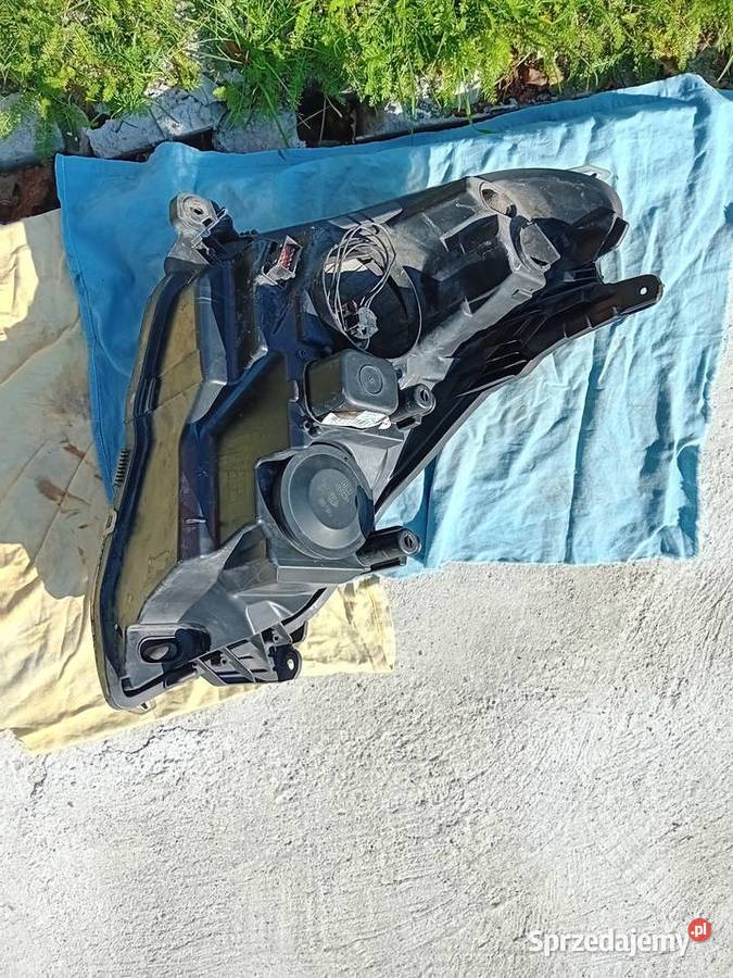 Lampy przód Opel Astra H