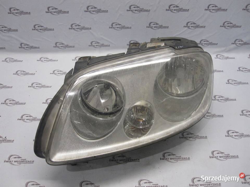 VOLKSWAGEN CADDY III 09r lampa lewy przód