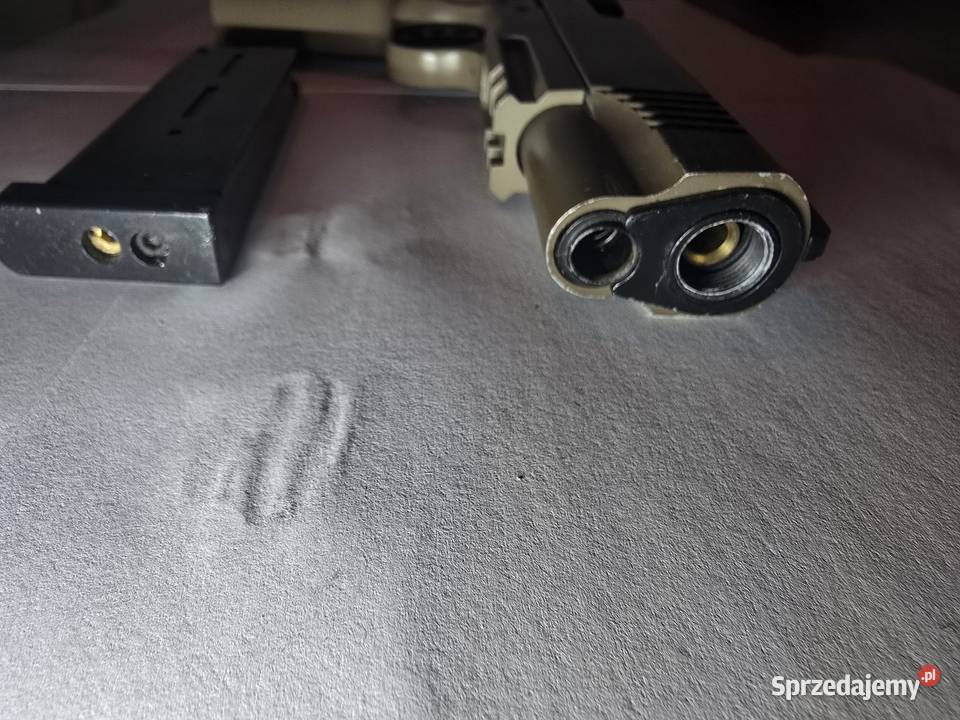 Pistolet 6mm Cybergun Colt 1911 A1 CO2 Rozogi
