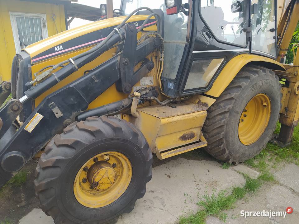 Sprzedam koparko ładowarkę CAT 428C Turbo 4x4 Koło