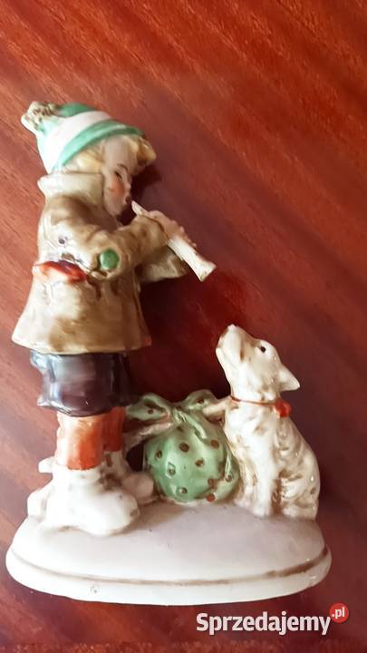 Figurka chłopca grającego na flecie pieskowi Gdańsk