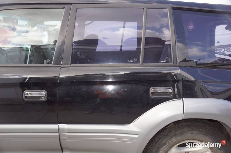 TOYOTA LAND CRUISER J90 90 DRZWI LEWE TYŁ 2001 Lipno