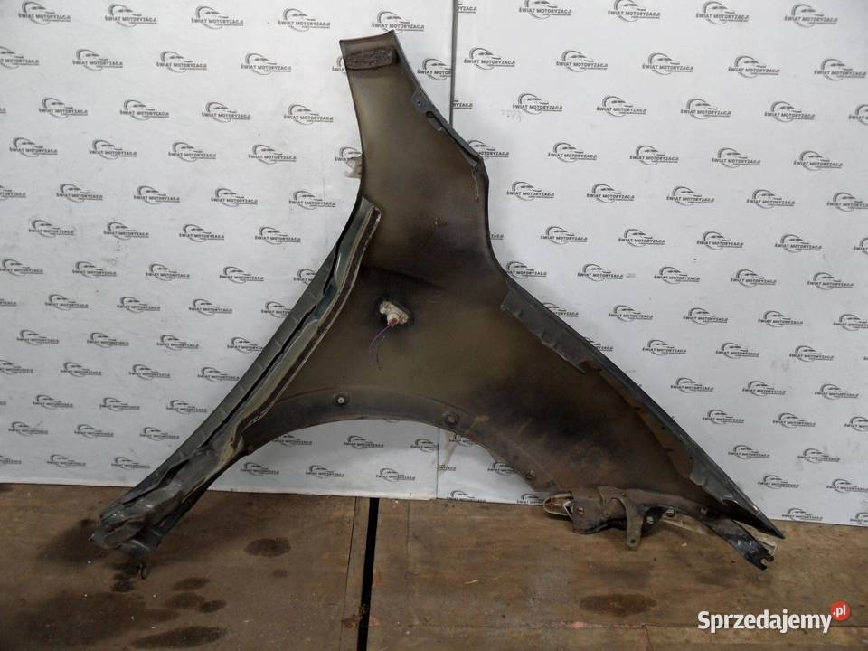 NISSAN JUKE 11r błotnik lewy przód
