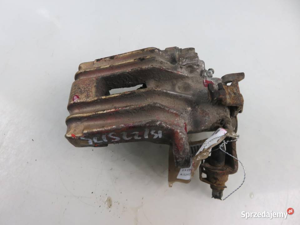 ZACISK LEWY TYŁ SEAT TOLEDO II 19 TDI