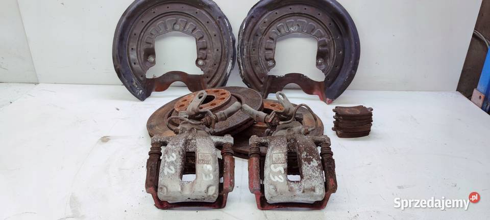 ZACISKI HAMULCOWE TYŁ AUDI A3 VW R32 32 310MM Przystajń