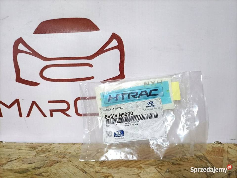HYUNDAI TUCSON NX4 MK4 22 EMBLEMAT BAGAŻNIKA Pleszew