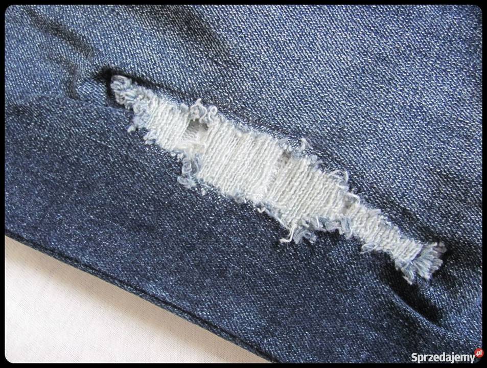 RAINBOW spodnie jeansowe z przetarciami 38 M Płock
