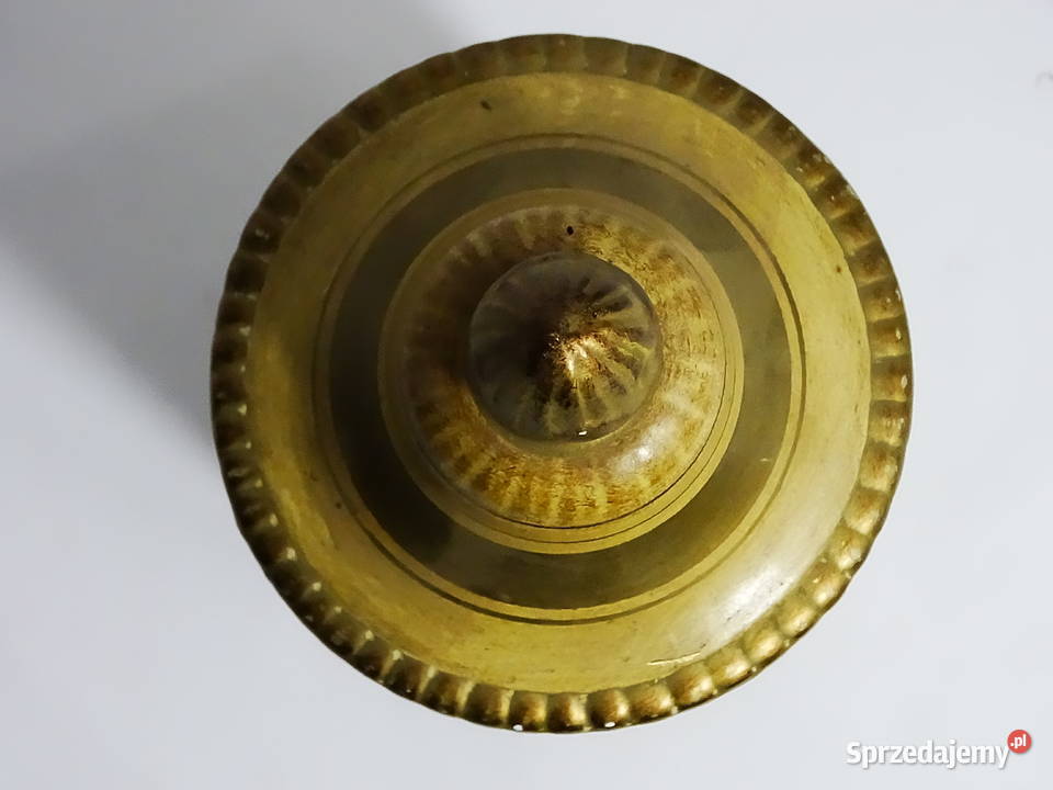 Zabytkowy pojemnik aptekarski z ilustracją