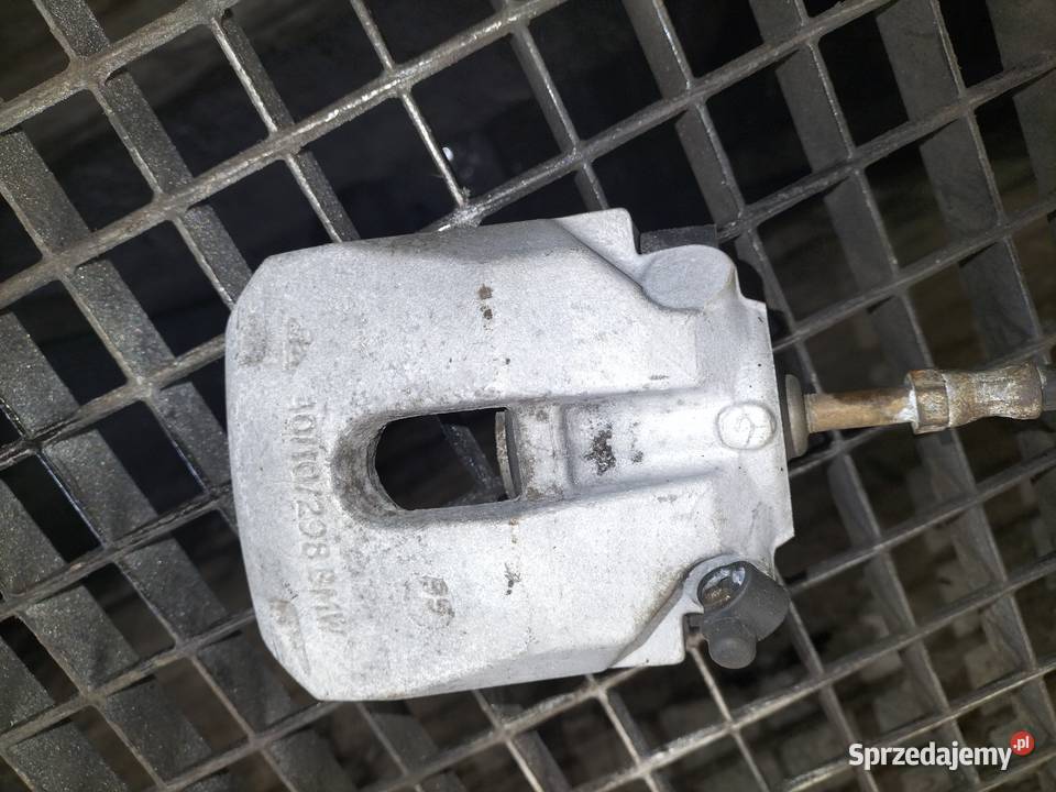 Zacisk hamulcowy prawy tylny BMW E39 SEDAN Poręba