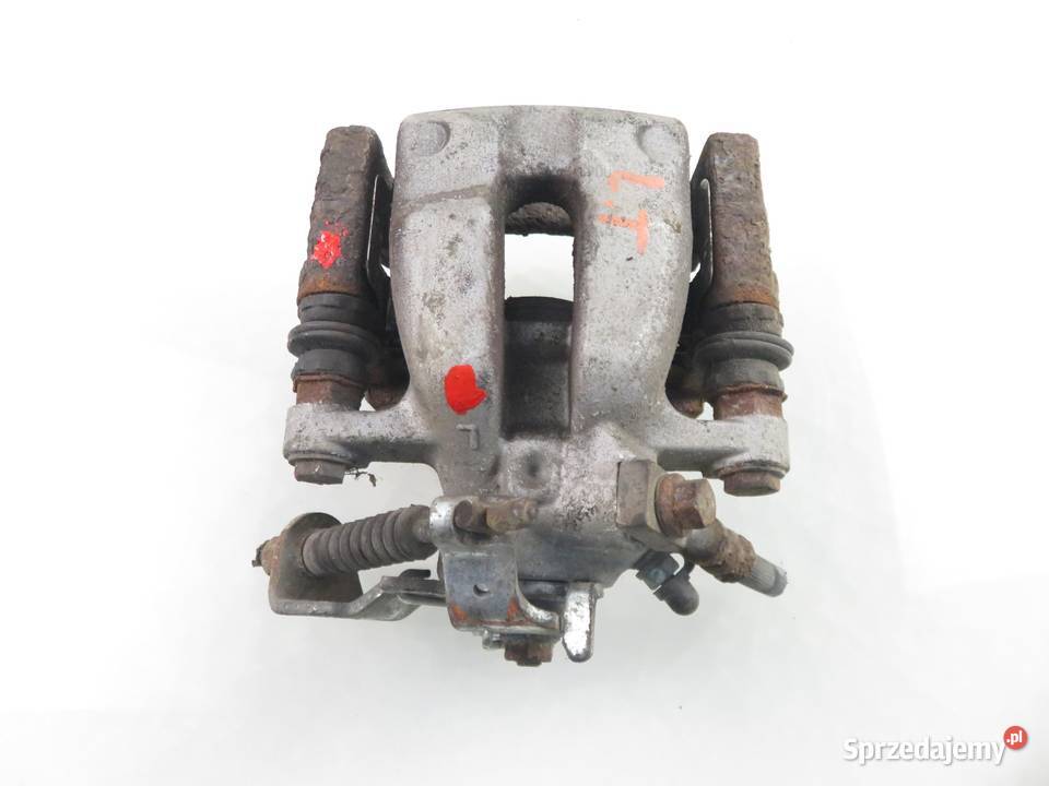 ZACISK LEWY TYŁ OPEL ZAFIRA A 20 DTI 16V