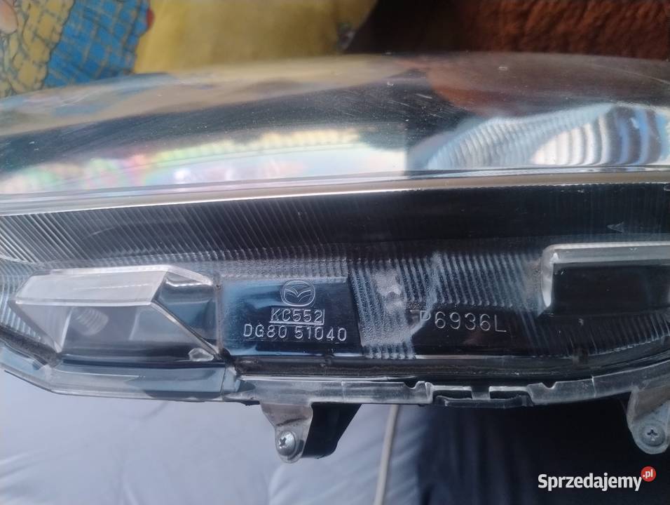 Mazda 2 0714 lampa reflektor lewa przednia przód lewe