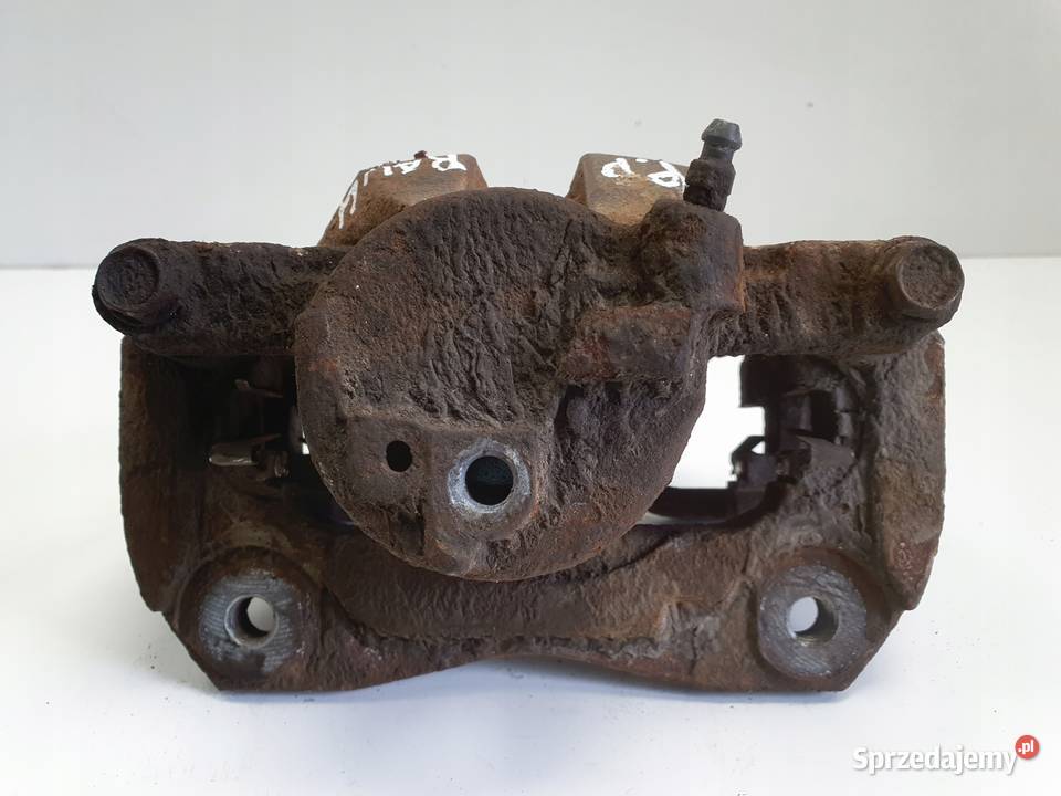 Toyota RAV4 IV III PRZEDNI ZACISK HAMULCOWY