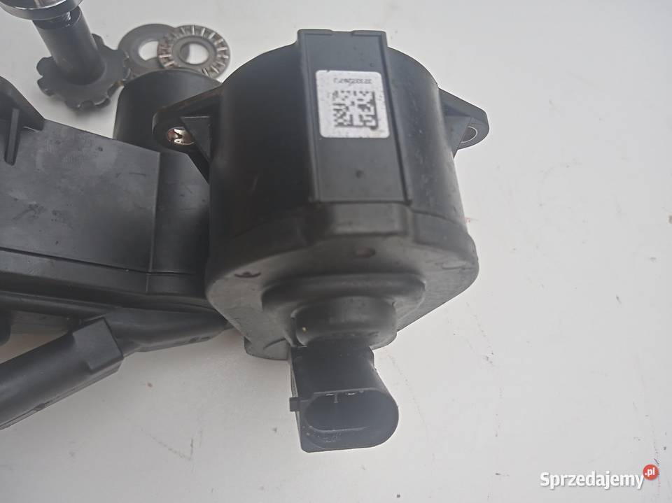 ZACISK MECHANIZM TŁOCZKA SILNICZEK TRW PASSAT B6 Zaciski i jarzma