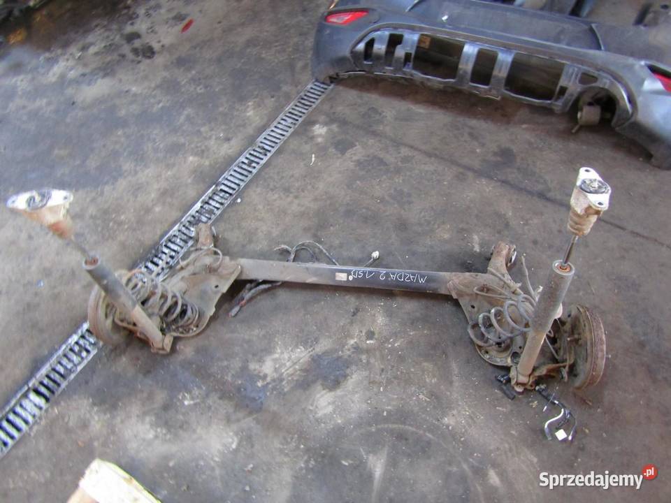 BELKA OŚ ZAWIESZENIA TYŁ TYLNA 15 B MAZDA 2 DJ sprzedam
