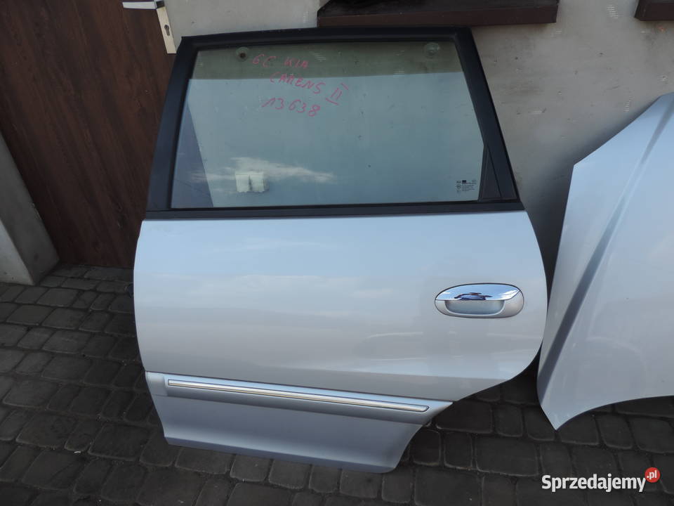 DRZWI LEWY TYŁ KIA CARENS II 0206 LAK 6C