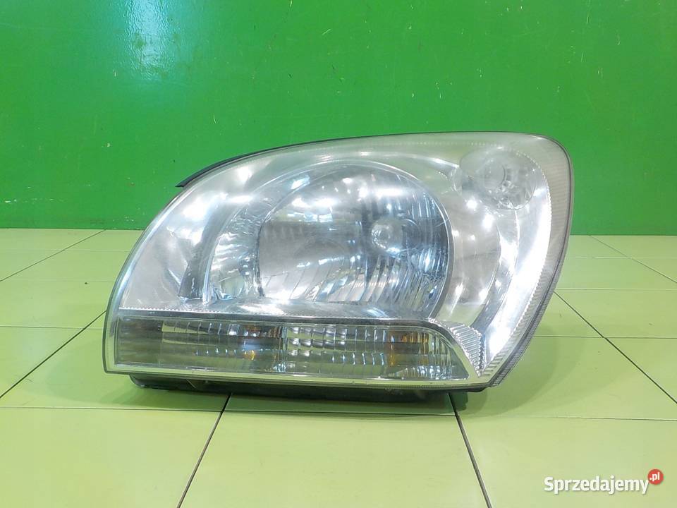 KIA SPORTAGE II 20 CRDI 05r 5D lampa lewa przod
