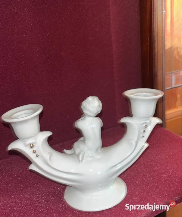 Świecznik z Putto grający na złotym flecie Syg Gdańsk