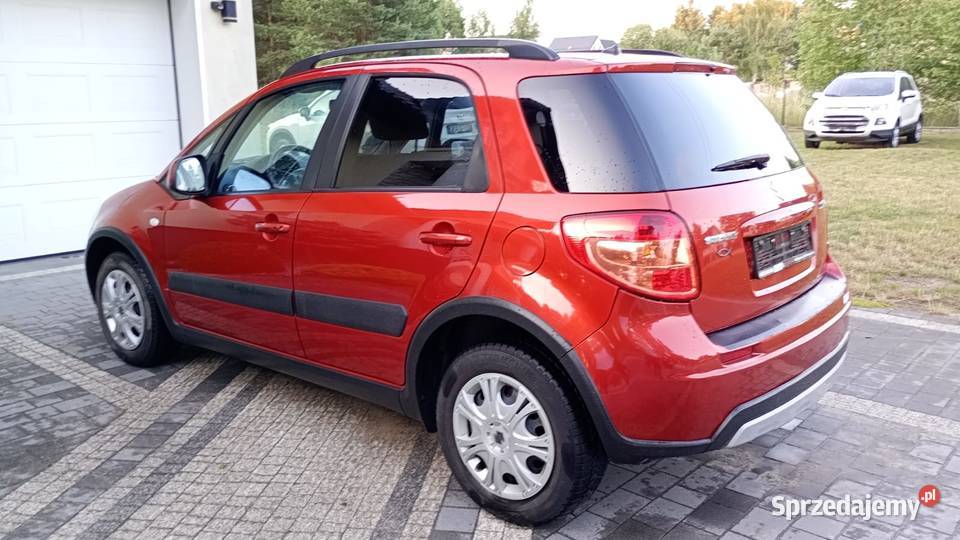 Suzuki SX4 16i ceglasty metalik 10r Rok produkcji 2010