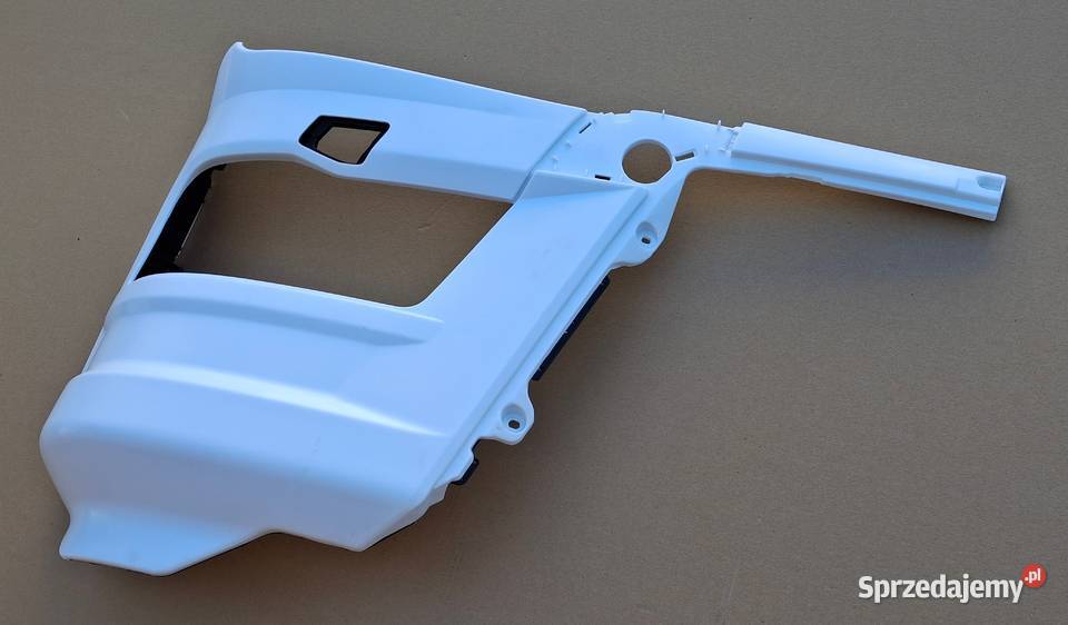 MAN TGX TG3 OKULAR REFLEKTORA LAMPY LEWY ZDERZAK Bieleń