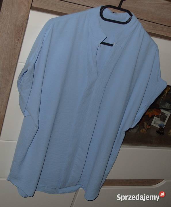 Baby Blue elegancka przewiewna bluzeczka r LXL Inny materiał Bluzki i koszule Rawicz
