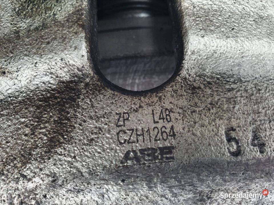 ZACISK HAMULCOWY PRZÓD LEWY VOLKSWAGEN PASSAT B6