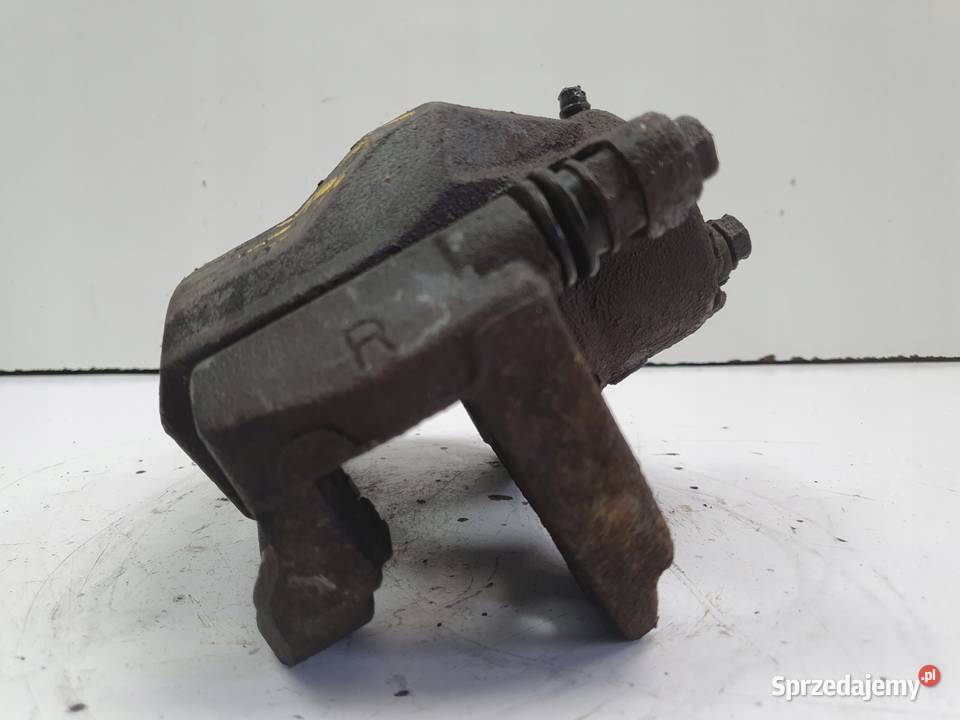 Toyota Camry VI PRAWY PRZEDNI ZACISK HAMULCOWY osobowe Rudka