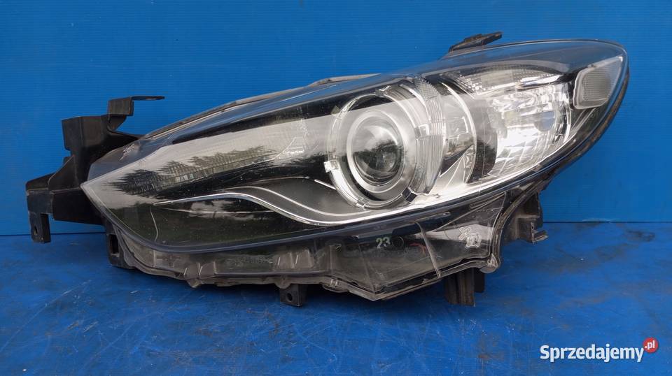 LAMPA REFLEKTOR LEWY PRZÓD EU XENON GHR451040 Lampy przednie Nowy Tomyśl sprzedam