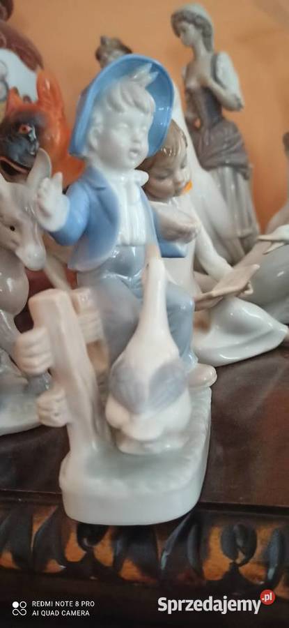 Figurka Chłopczyk na płocie z gąską