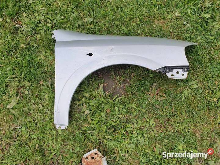 Błotnik prawy srebrny opel Astra G 9809 z Kraków