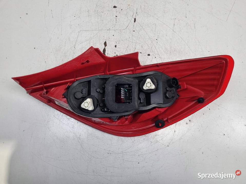 Opel Corsa D 3D HTB 0614r TYLNIA LAMPA LEWA LEWY Janów