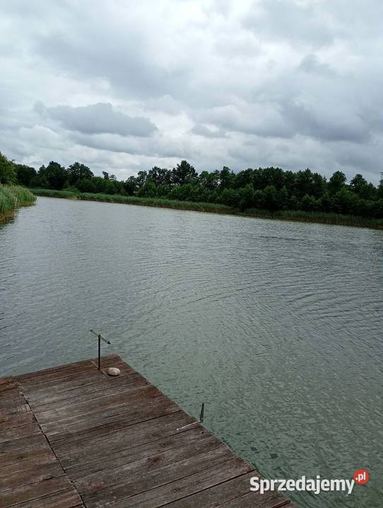 Działka jeziorem 1638m2 Nieruchomości sprzedam