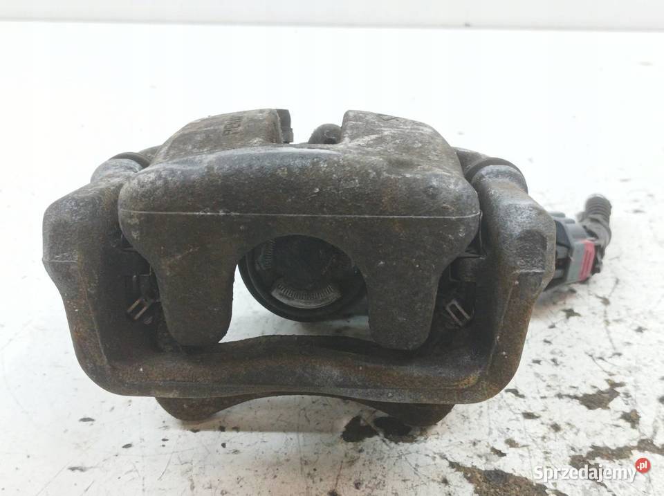 ZACISK HAMULCOWY LEWY TYŁ 17 DCI 440102238R