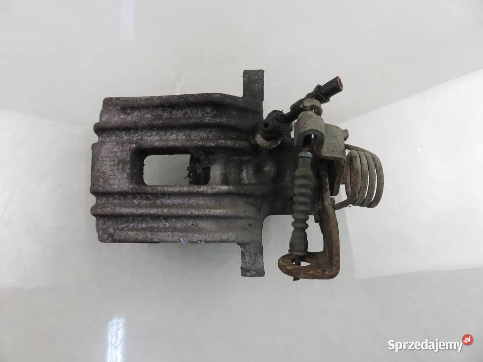 ZACISK LEWY TYŁ AUDI A4 B6 19 TDI