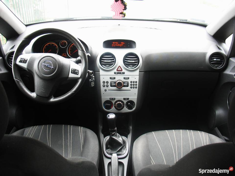 Srebrny OPEL CORSA D 12 Pb 2009 HB 5 drzwi