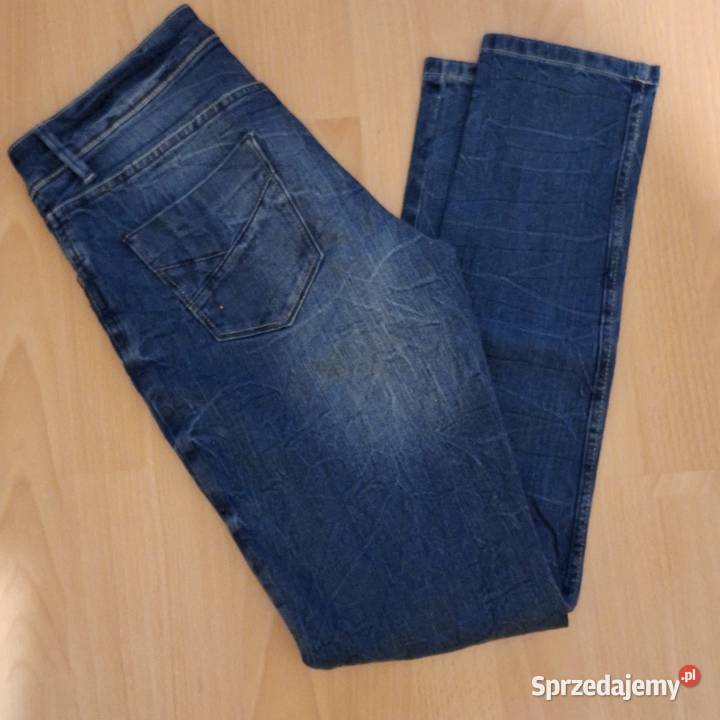 Spodnie jeansy damskie z przetarciami skinny M Spodnie Połaniec