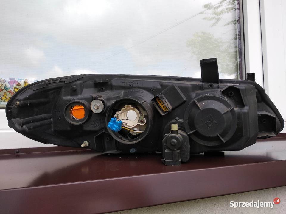 Nissan Almera N16 LIFT FL lampa przednia lewa