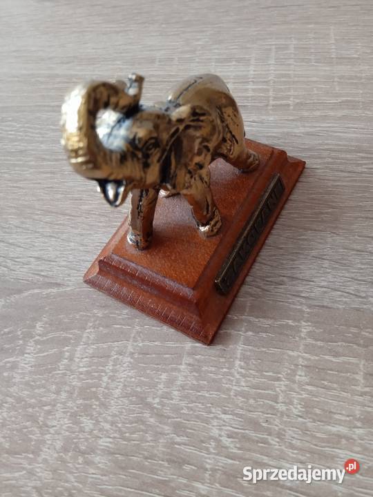 Figurka słonik na drewnianej podstawie pamiątka Poznań