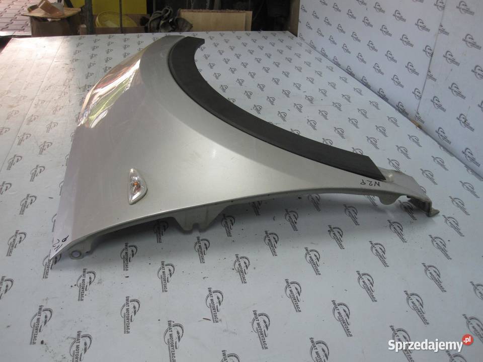 KIA SPORTAGE III 12r błotnik prawy przód