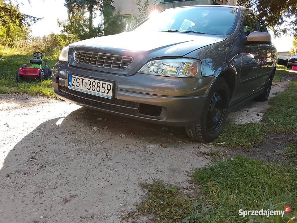 Opel Astra Długie OPŁATY 062026 brązowy